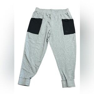 Puma Gray and Black Colorblock Men's Joggers with Pockets.